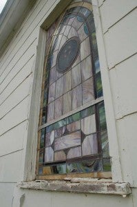 Deterioration around stained-glass windows is of the many physical and structural problems that Ridgeway Baptist Church is facing.