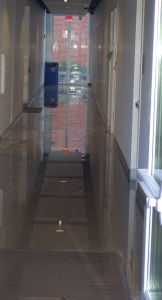 Water stands on the ground floor of Bedford Hall.