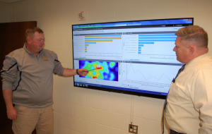 Capt. A.Q. “Andy” Ellington, left, discusses crime trends using Command Central — a program new to the Farmville Police Department — with Lt. William “Bill” Hogan.