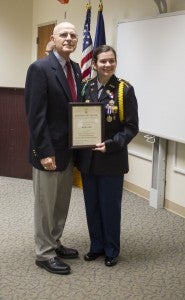 CARSON REEHER | HERALD Cadet Lieutenant Brittny Price poses with Brigadier General Edwin Kelley Jr. after he awarded her with the Legion of Valor Bronze Cross for Achievement for her involvement with Cumberland High School’s JROTC as Battalion Commander.