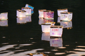 Decorated lanterns float on Goodwin Lake in memory of 9/11 victims.