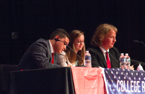 CARSON REEHER | HERALD Members of the College Republicans, from left, Josue Gallardo, Kaitlyn Owens and Geoffrey Goodwin, prepare to answer a debate question.