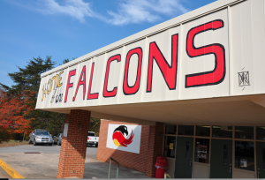 JORDAN MILES | HERALD Berezhaya has not only inspired her peers through her personal art but through her murals around Fuqua’s campus. She painted the words and falcon symbol on this building. 